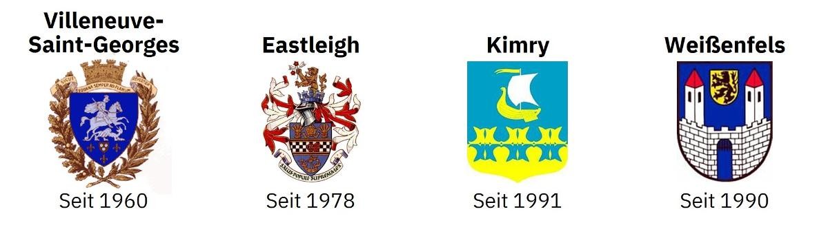 Stadtwappen der 4 Partnerstädte Villeneuve-Saint-Georges, Eastleigh, Kimry, Weißenfels